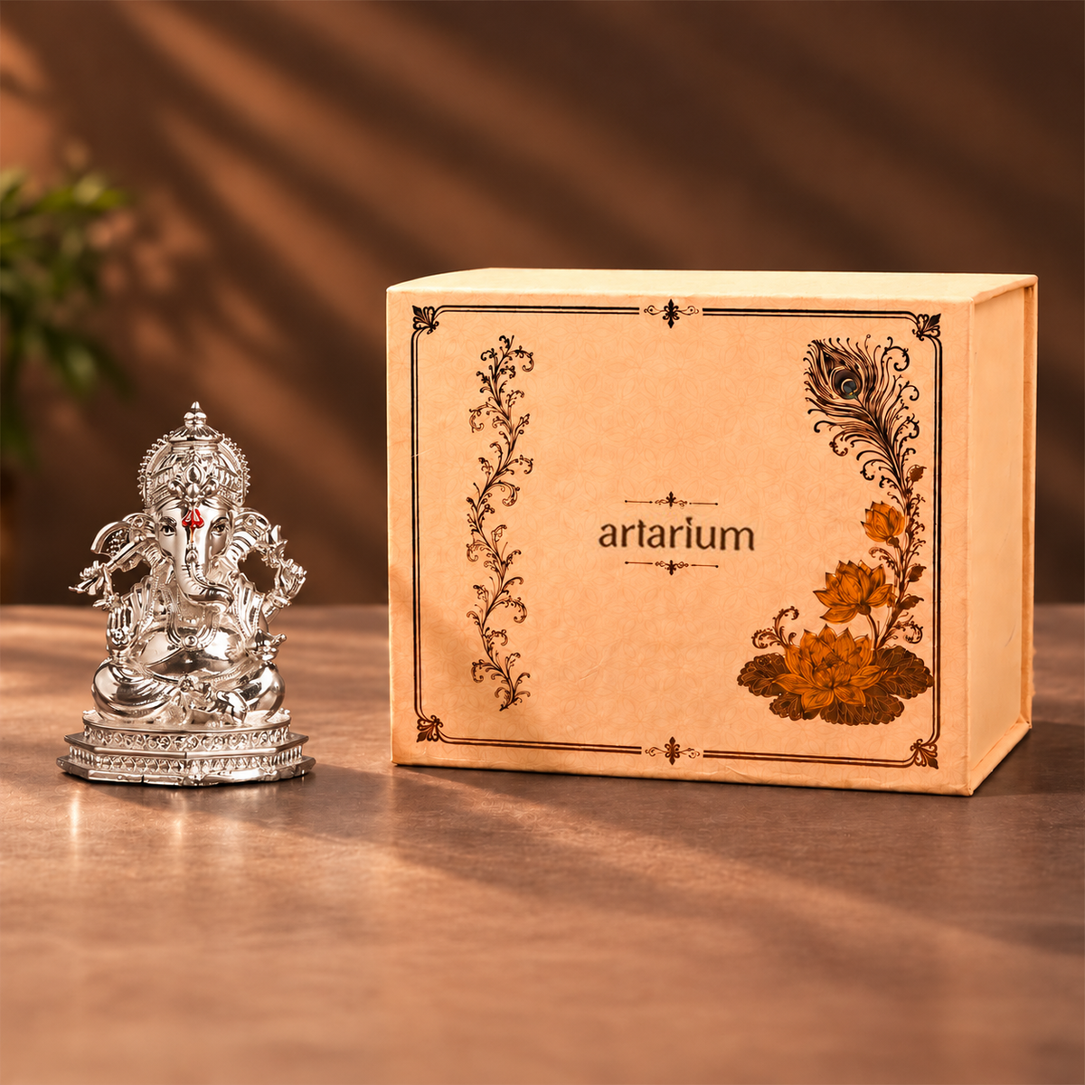 Divine Ganesha silver-plated idol with premium packaging 